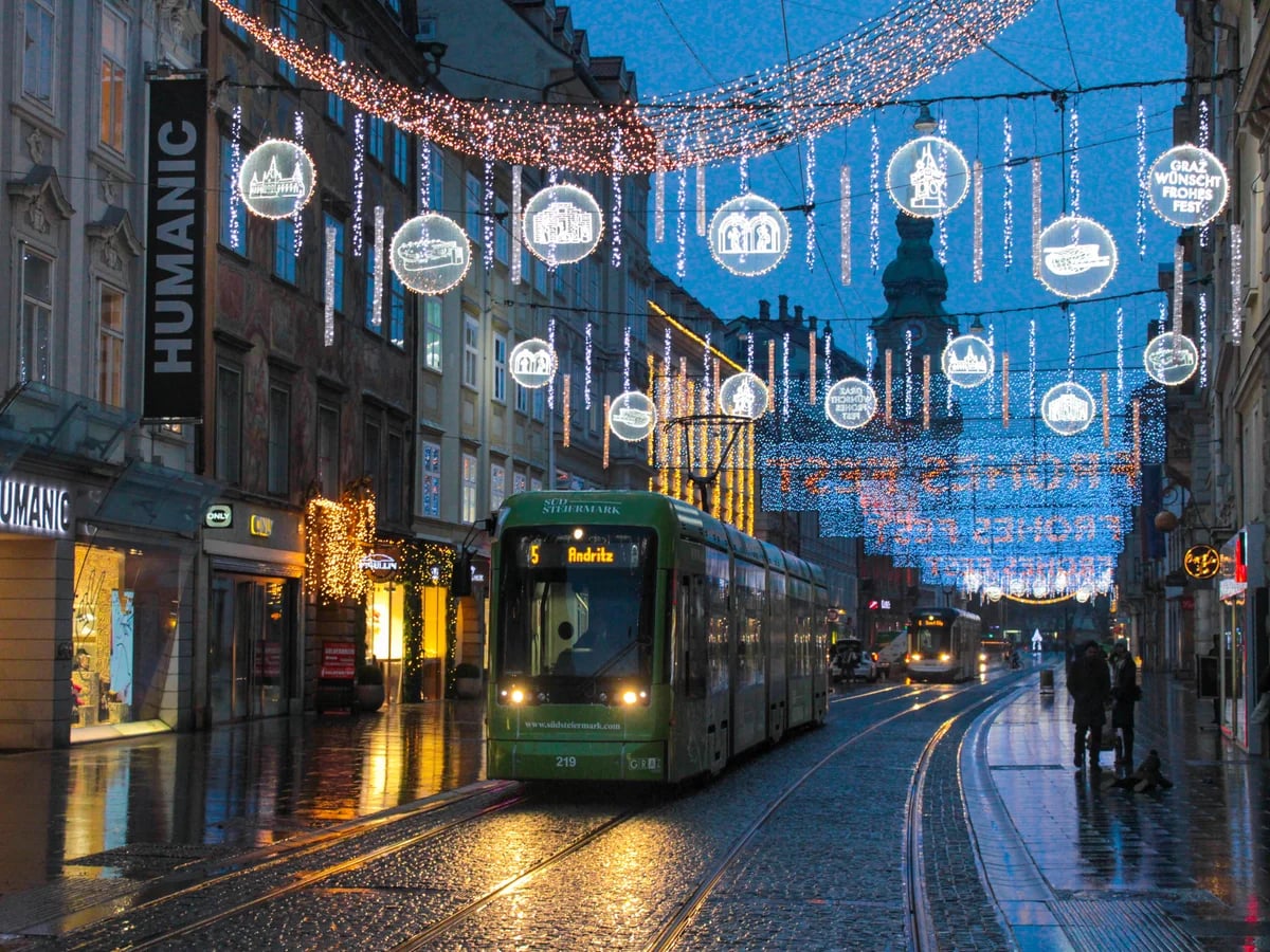 Graz tram 219 gliding through Herrengasse in a magical Christmas atmosphere