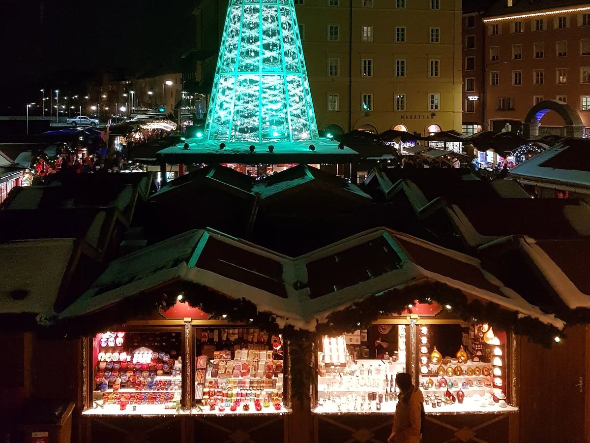 Innsbruck illuminated Christmas tree in Marktplatz at night