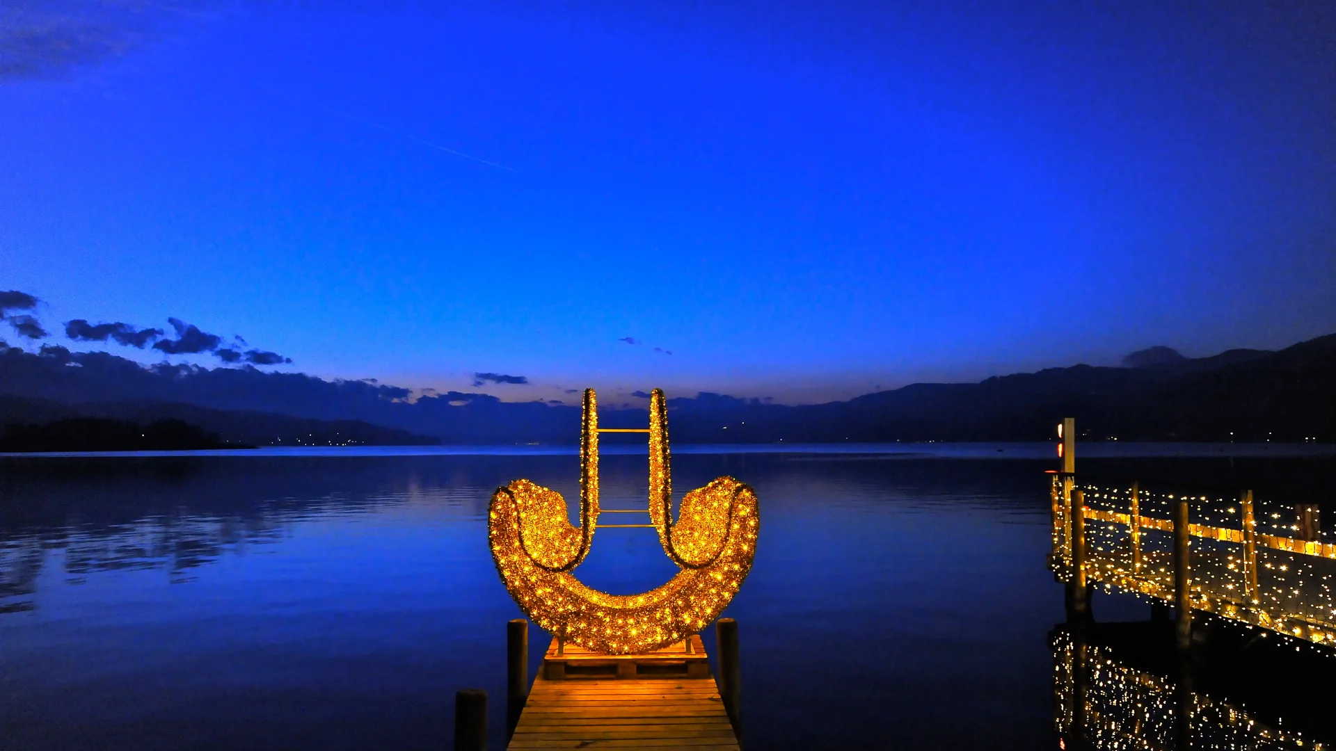 Klagenfurt whimsical smiley-face light installation during winter