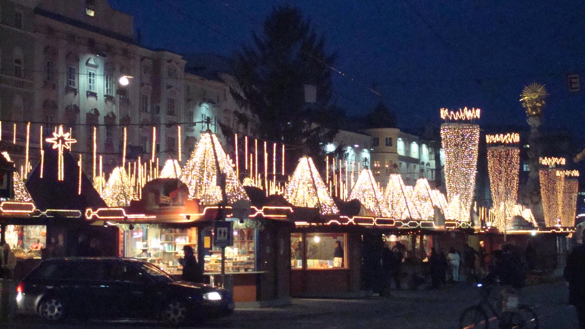 Linz illuminated pyramid structures in Hauptplatz during winter evening