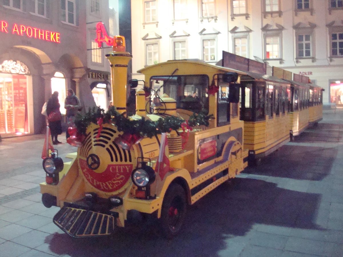 Linz City Express train adorned with festive decorations during Linz winter season