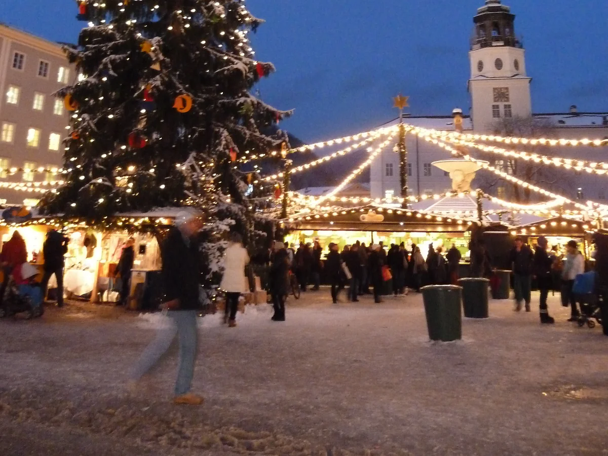 Salzburg Cathedral tower illuminated during a magical Salzburg Christmas market evening