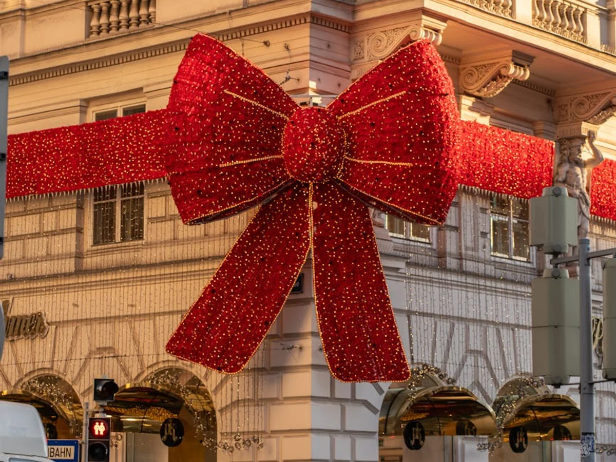 Vienna festive red bow decoration during winter golden hour