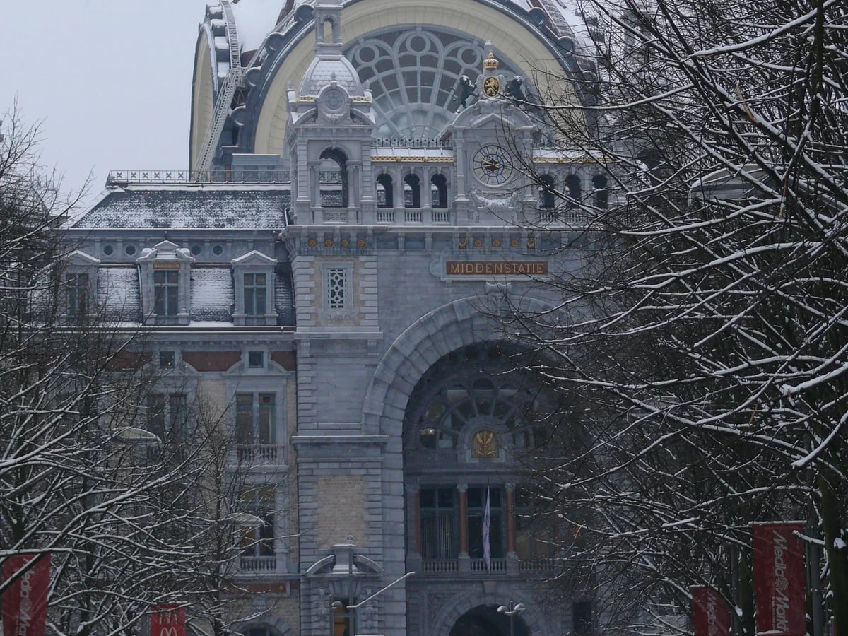 Antwerp Central Station's Belle Époque dome blanketed in winter snow