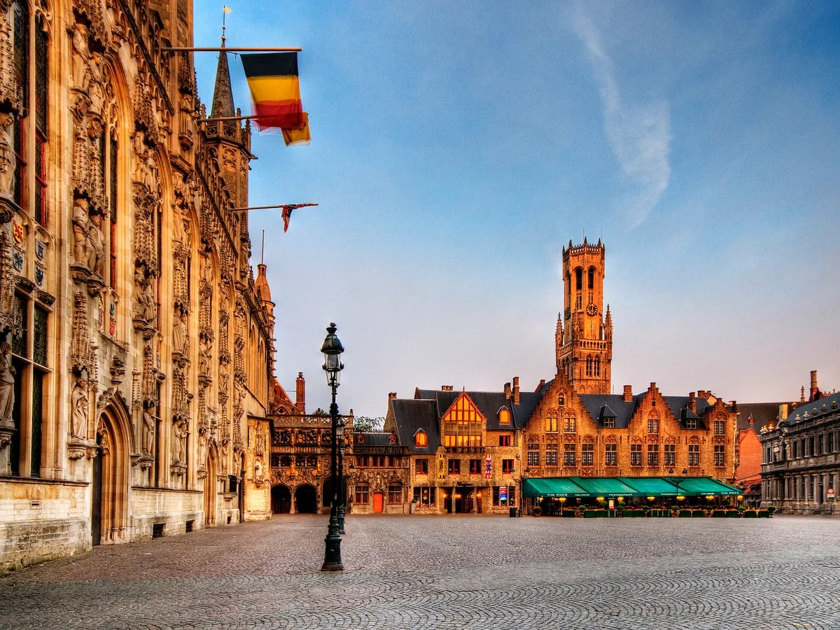 Bruges Belfry tower and medieval Burg square in winter light