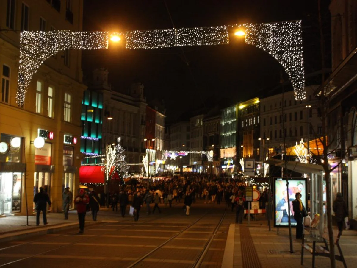 Brno's enchanting blue-hour Christmas market with golden lights