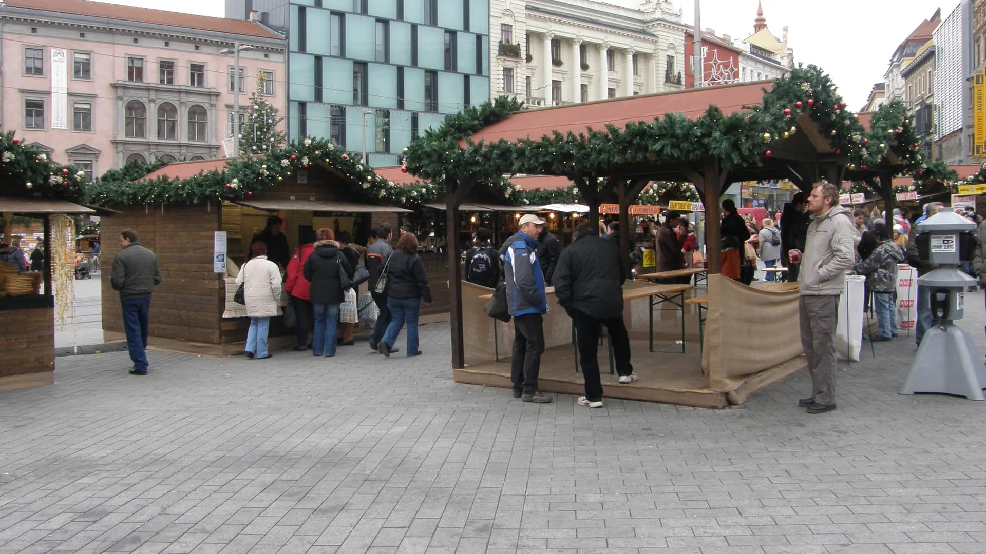 Brno authentic Christmas market on Freedom Square with twin-domed architecture in winter