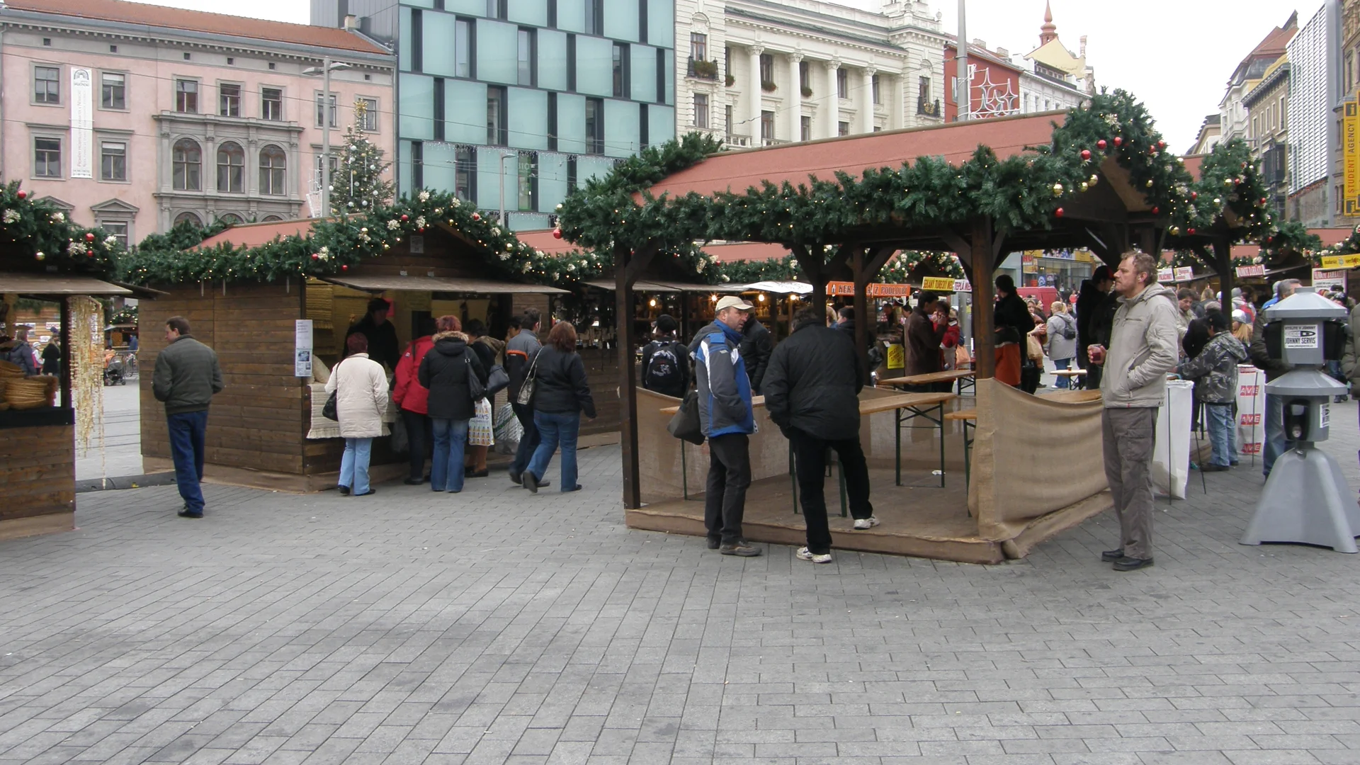 Brno authentic Christmas market on Freedom Square with twin-domed architecture in winter