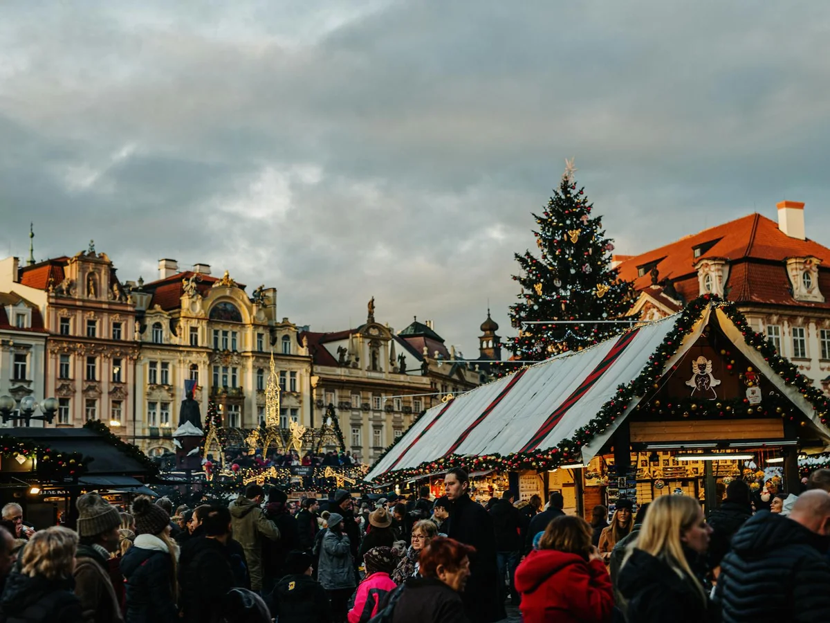 Prague Old Town Square Christmas market bustling with festive cheer