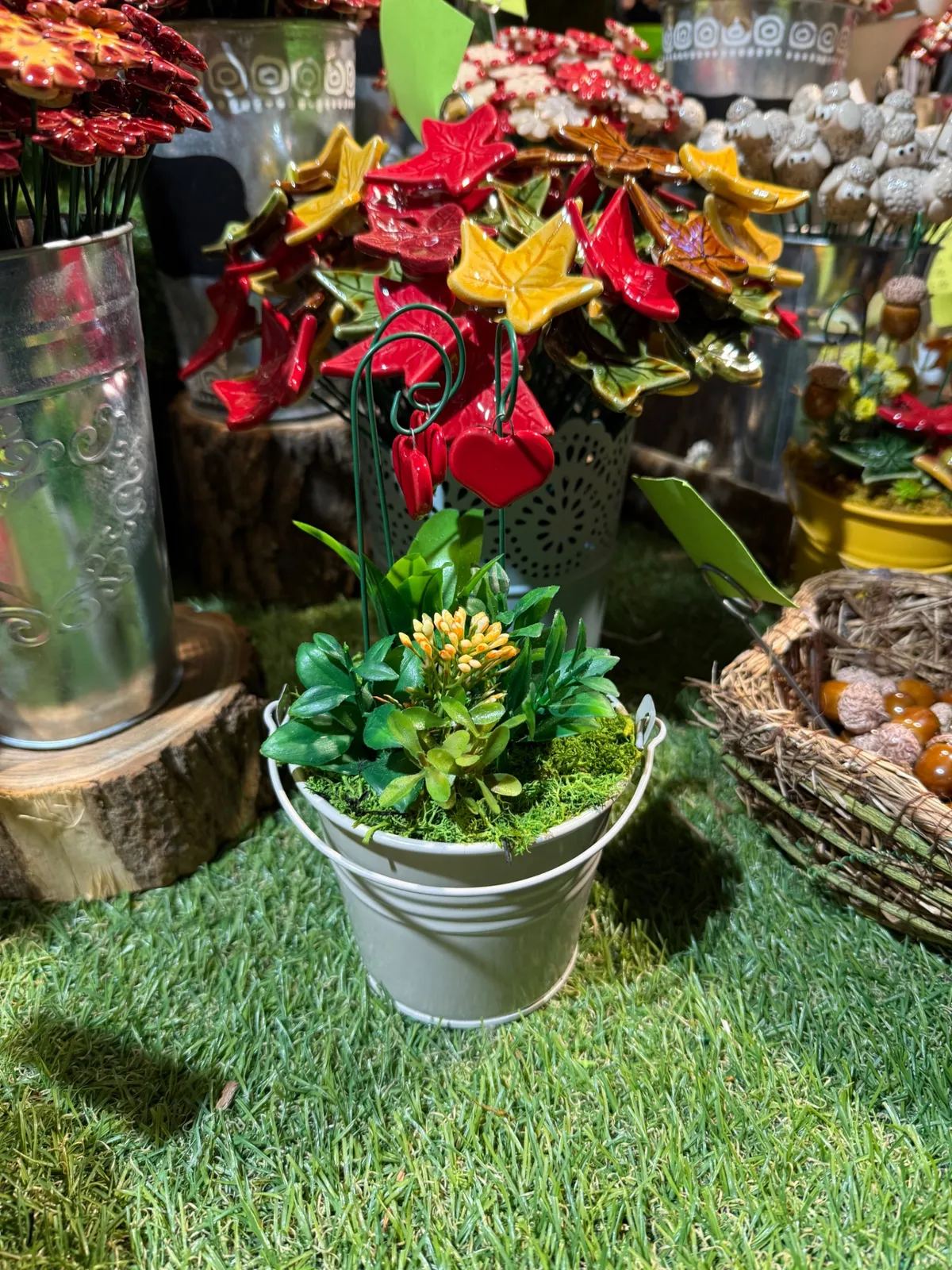 Vibrant festive decorations and lights at an Unknown Christmas market close-up.