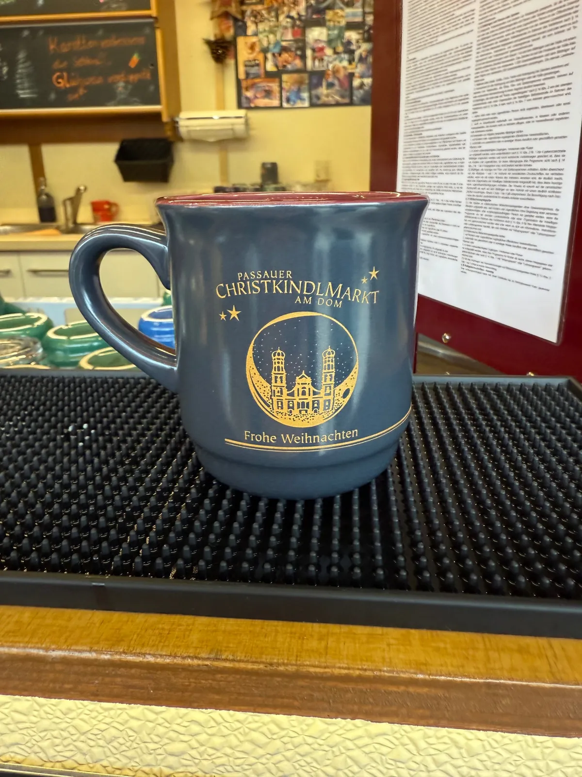 Festive decorations and twinkling lights create a magical atmosphere at an unknown Christmas market.