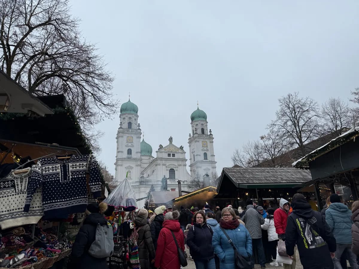 Festive decorations and twinkling lights at an unknown Christmas market, creating a magical atmosphere.