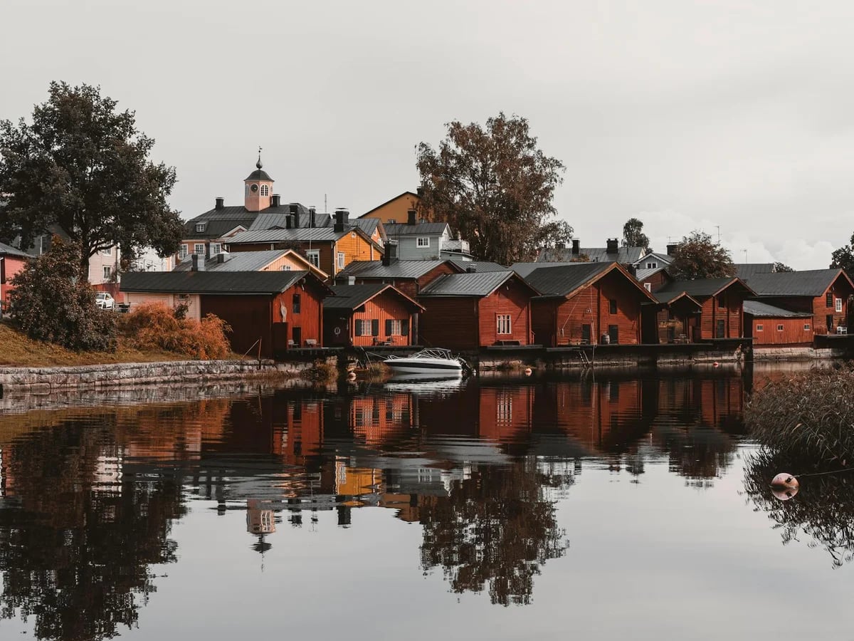 Porvoo iconic red wooden buildings winter reflection