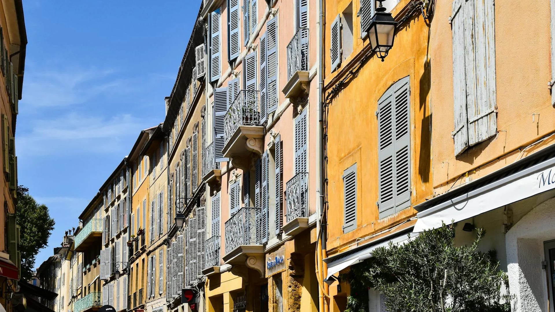 Charming street in Aix-en-Provence showcasing historic architecture in winter