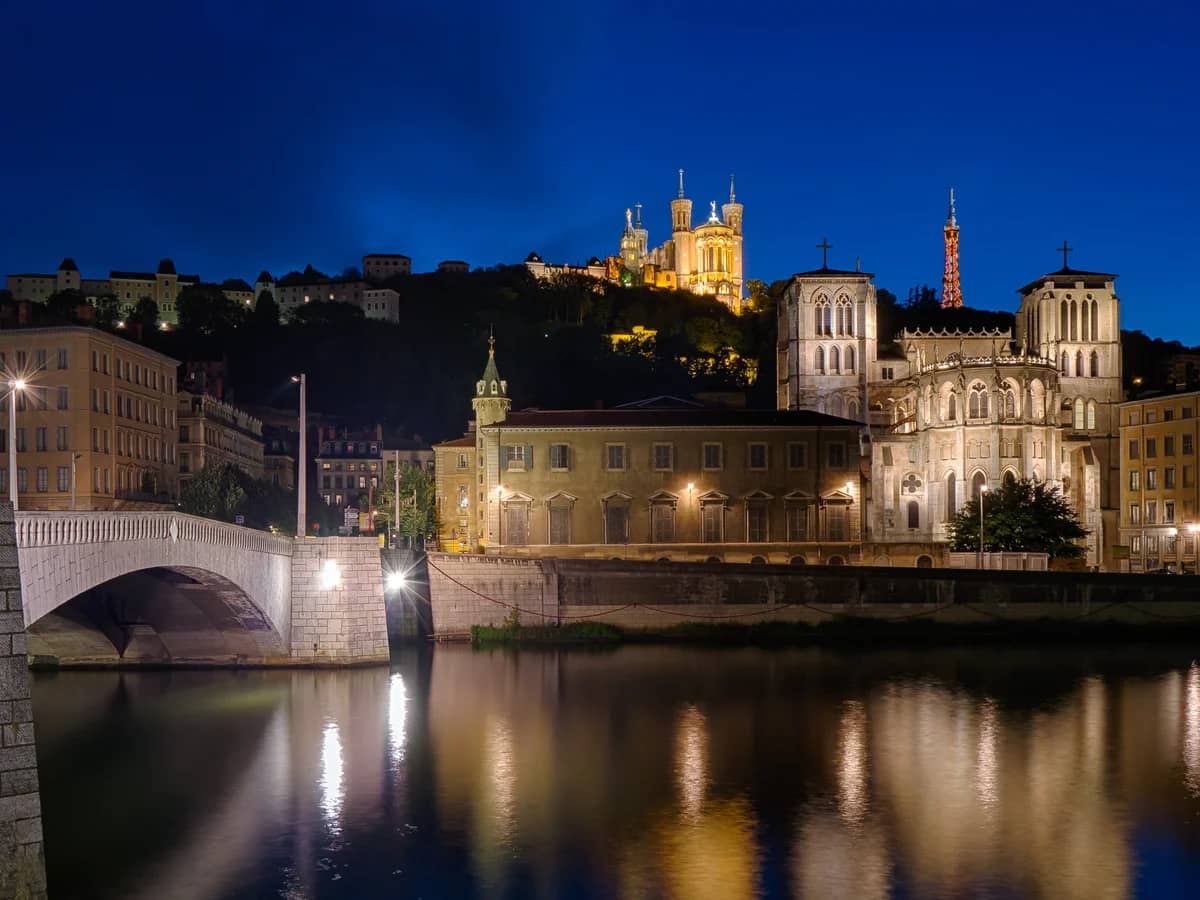 Lyon Basilica Notre-Dame de Fourvière glowing in winter night