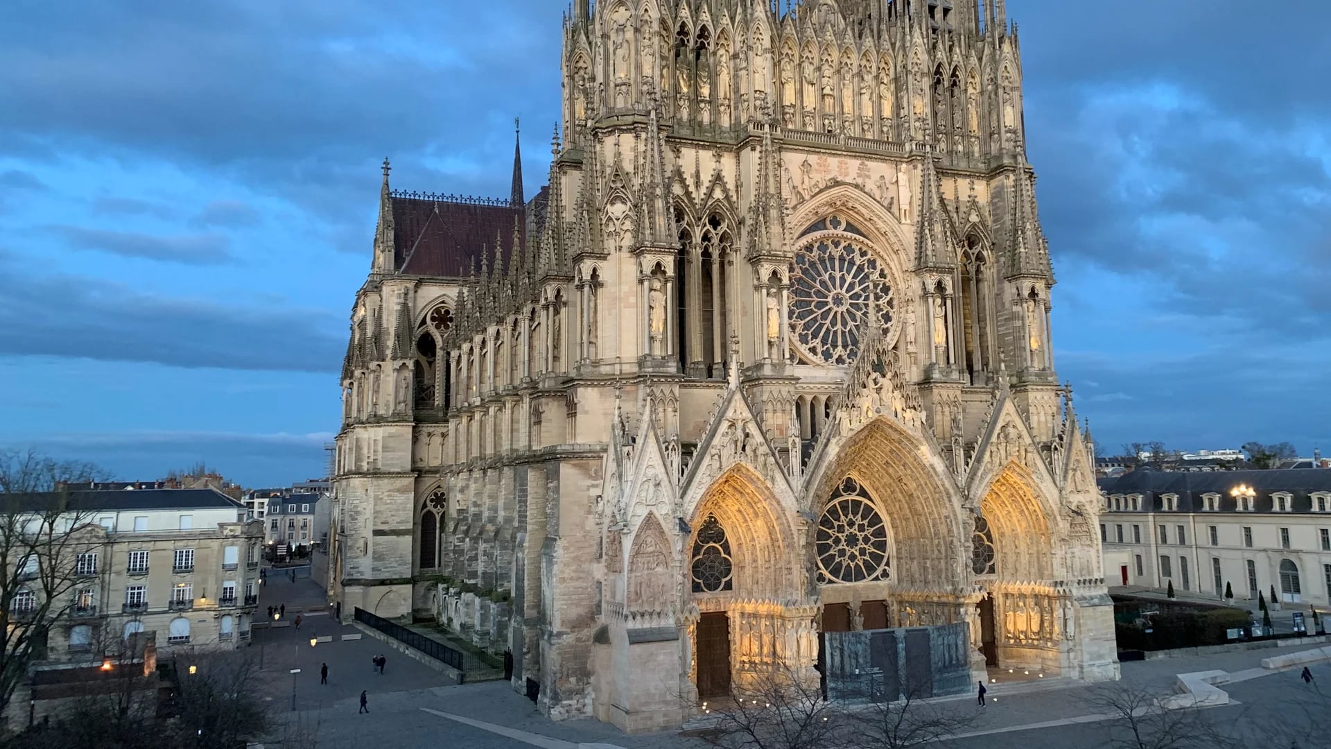 Reims Cathedral illuminated at blue hour during winter season