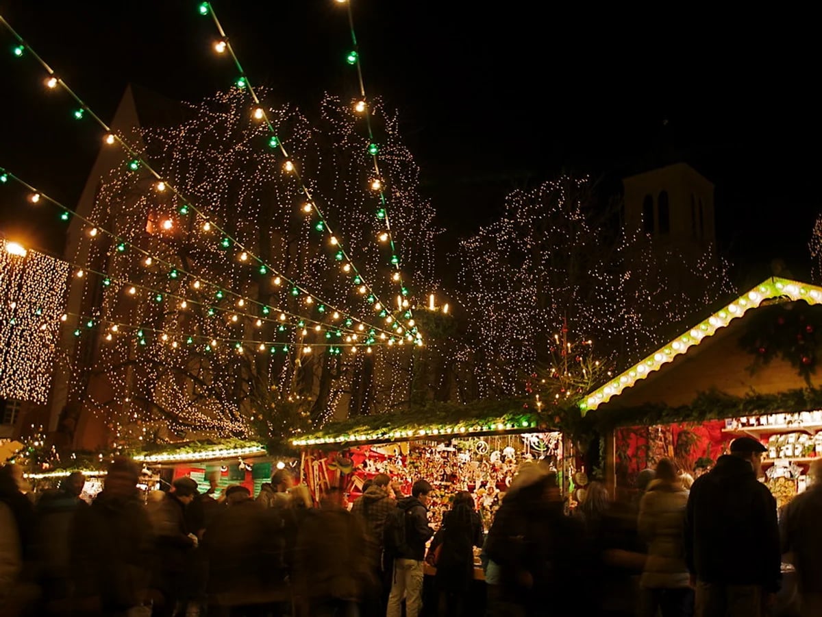 Augsburger Christkindlesmarkt glowing lights Augsburg festive atmosphere Perlachturm tower