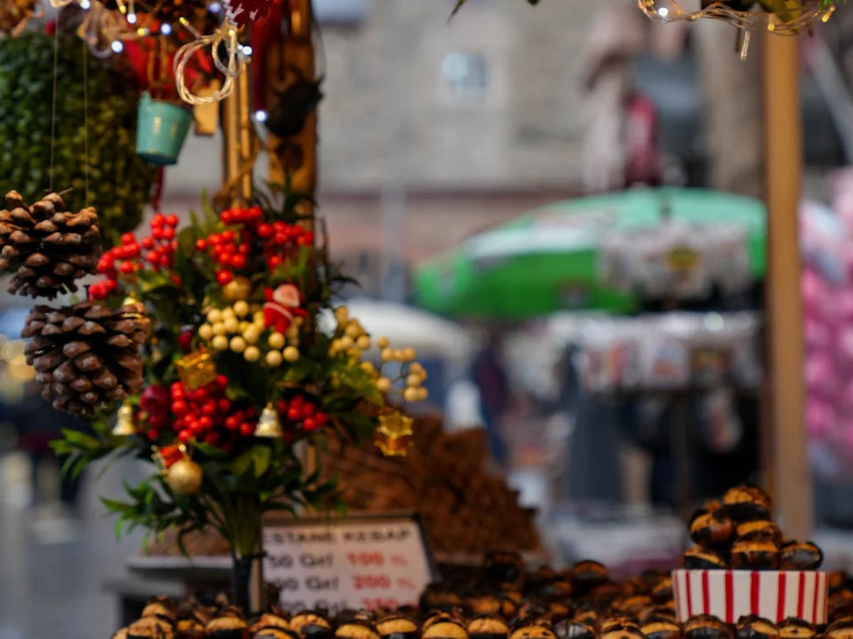 Bamberg Christmas market stall decorations glowing in warm winter light