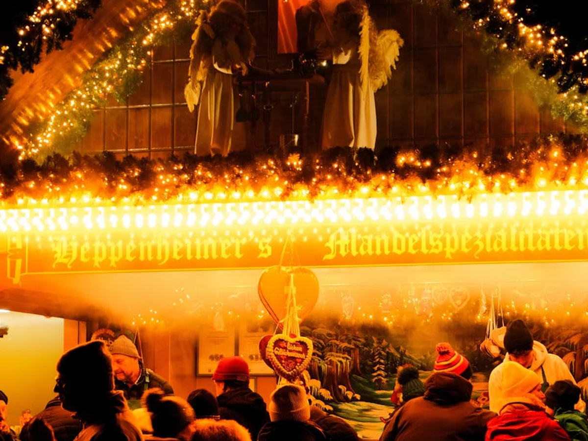 Bamberg magical Christmas market stall glowing in winter evening