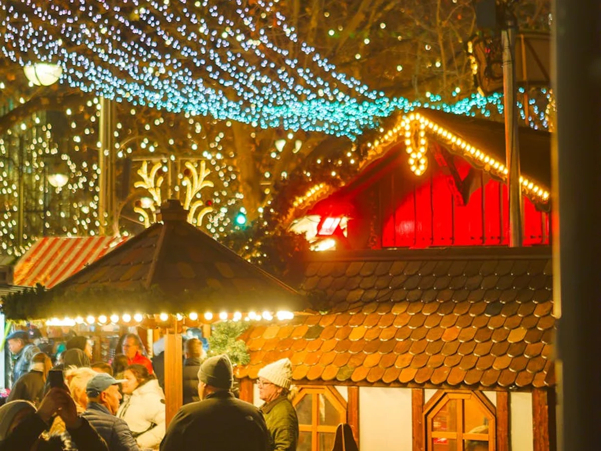Berlin enchanting Christmas market with festive lights and wooden stalls