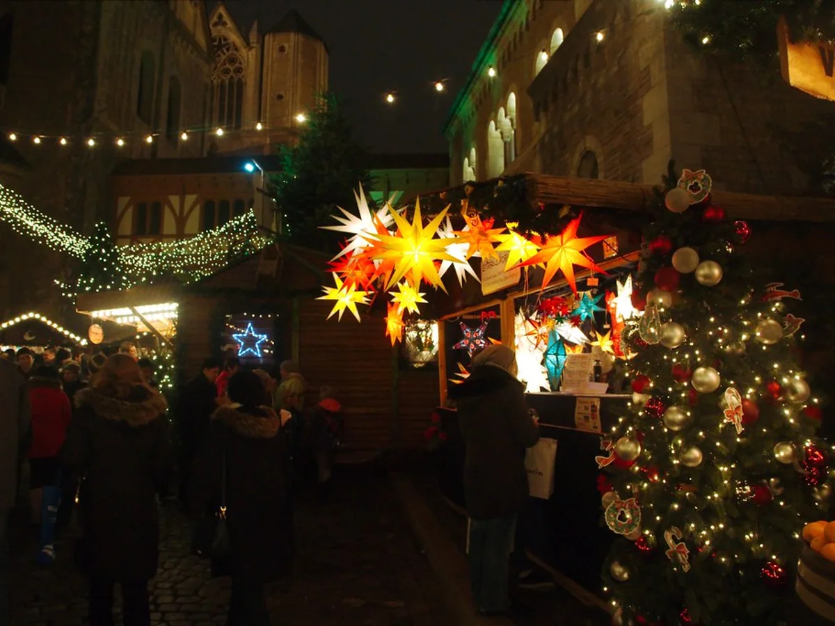 Braunschweiger Weihnachtsmarkt glowing at blue hour in Braunschweig, festive atmosphere at Burgplatz