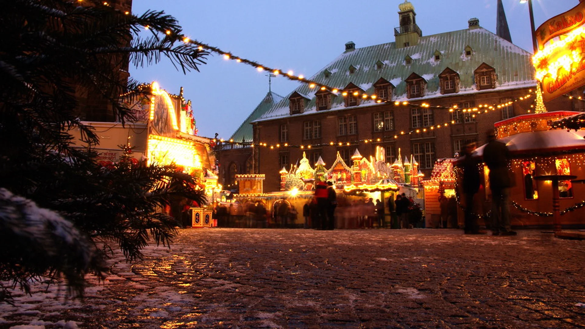 Weihnachtsmarkt Bremen festive wooden stalls and warm lights in Bremen at Bremer Marktplatz