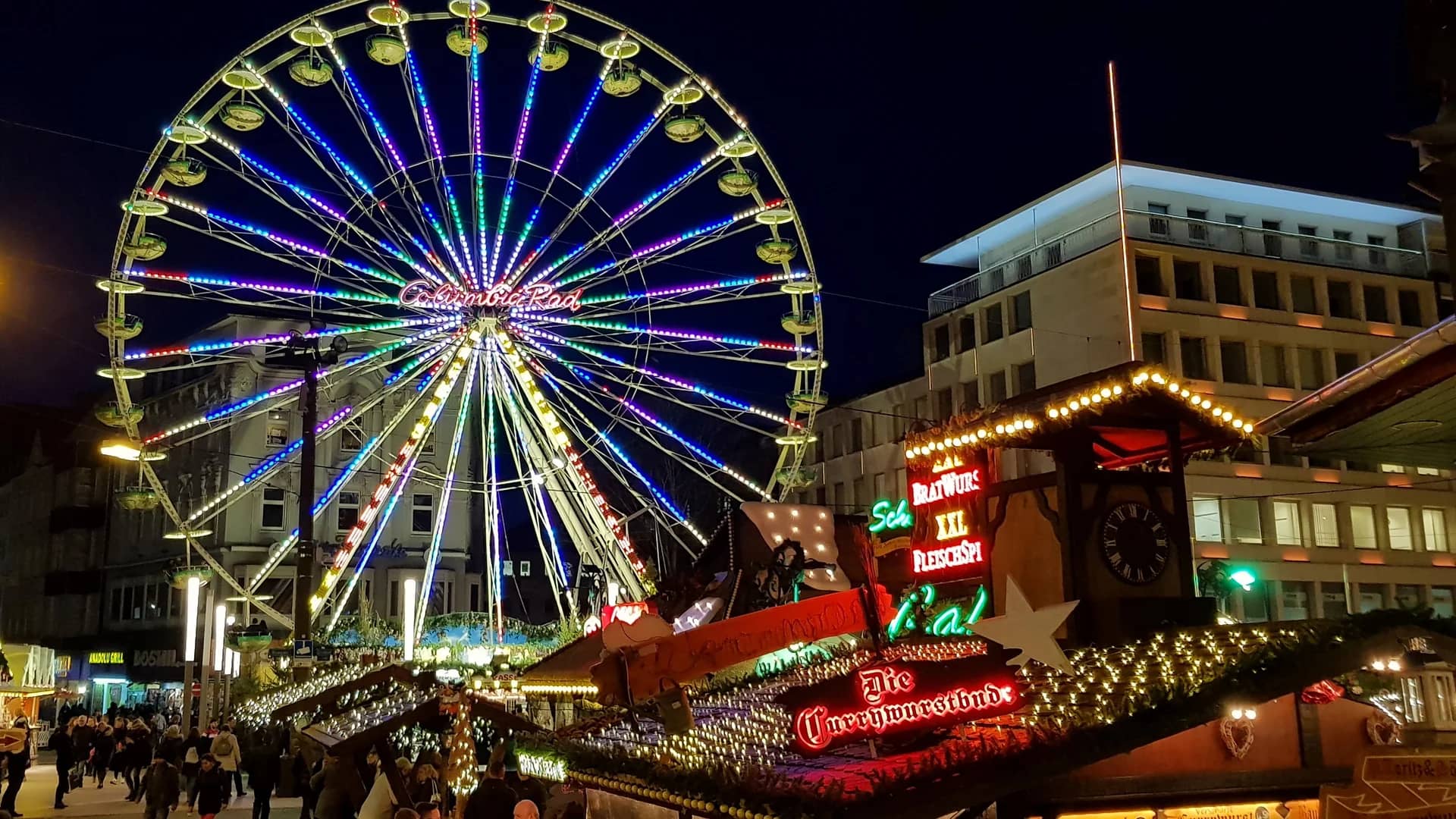 Dortmund illuminated Ferris wheel during a magical Christmas market night
