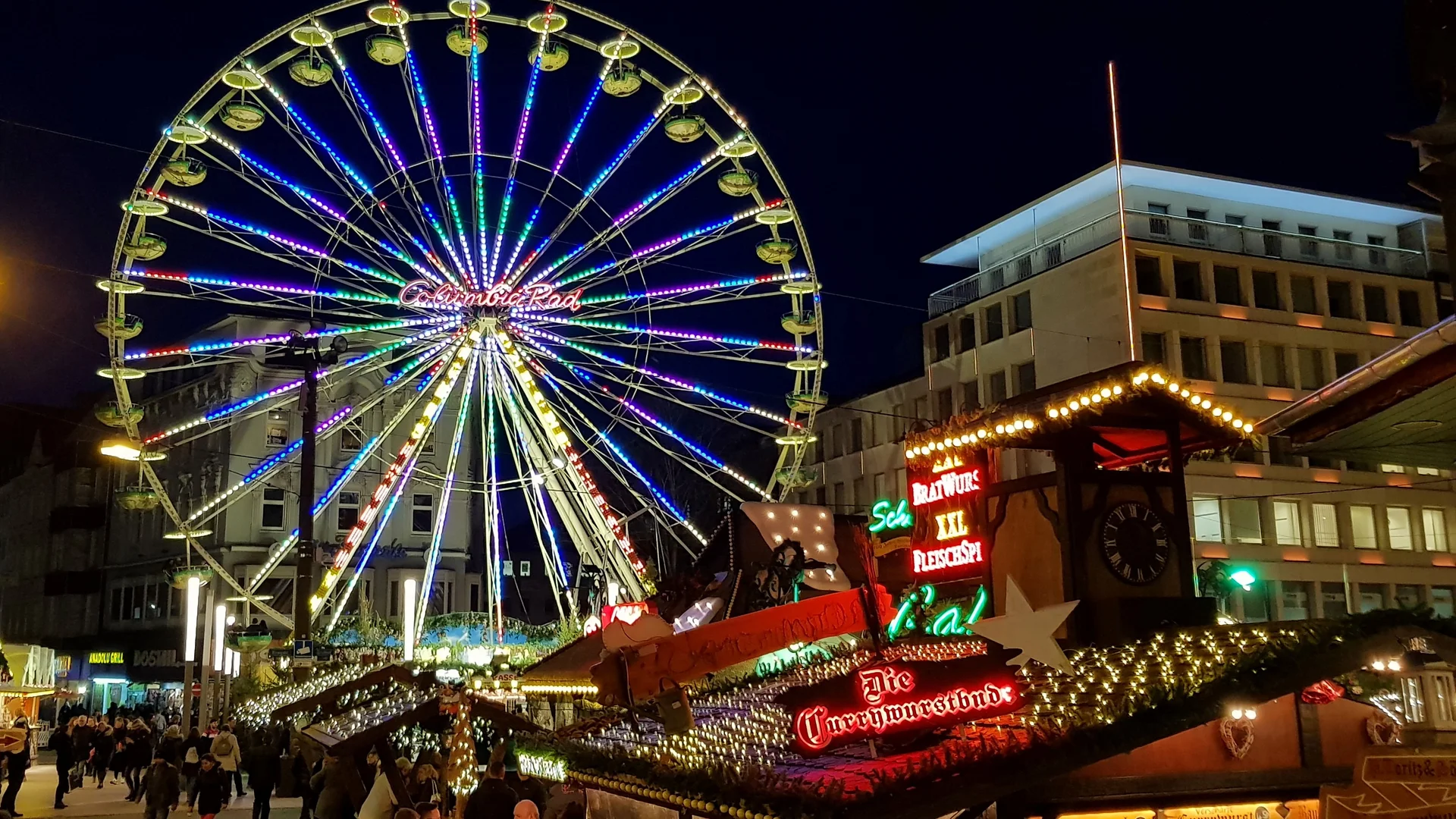 Dortmund illuminated Ferris wheel during a magical Christmas market night