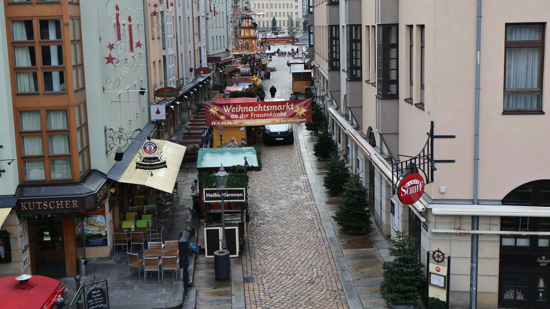 Dresden Frauenkirche Christmas market bustling with festive atmosphere