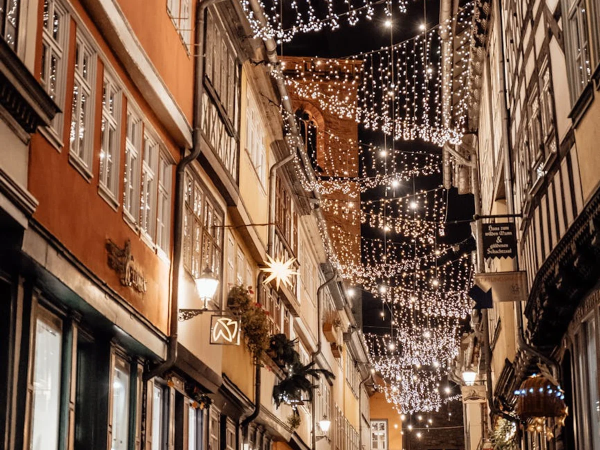 Erfurt enchanting cobblestone street adorned with festive lights in winter