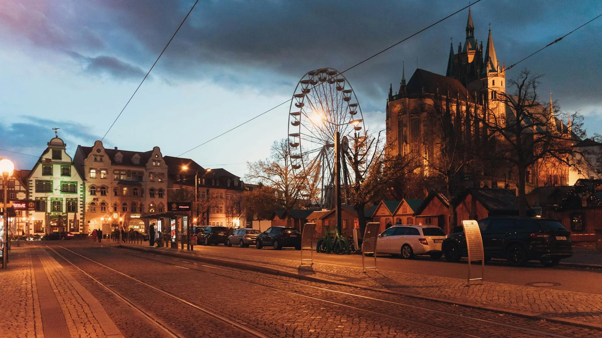 Erfurt Stephansdom cathedral and Riesenrad illuminated during winter blue hour