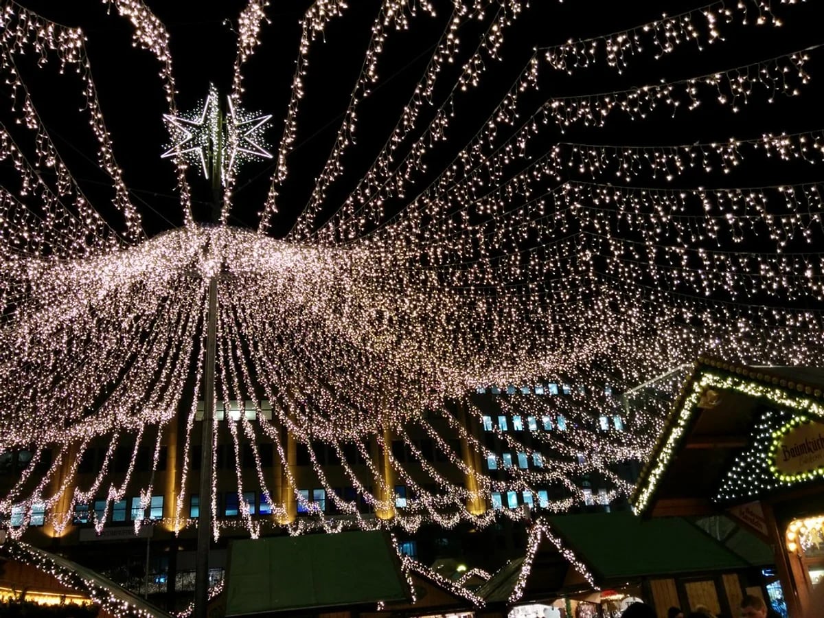 Internationaler Weihnachtsmarkt Essen - Kennedyplatz glowing fairy lights create a magical atmosphere in Essen