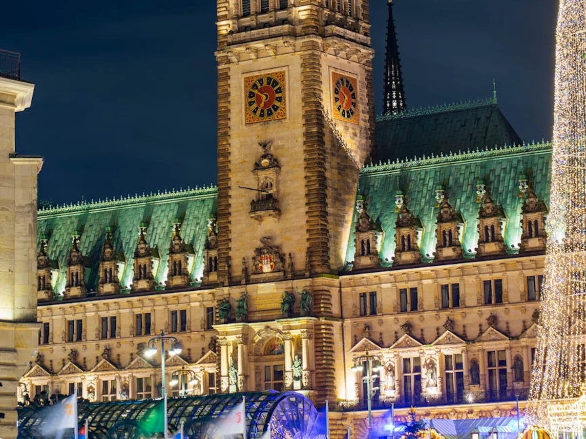 Hamburg Rathaus tower illuminated during Christmas winter festivities