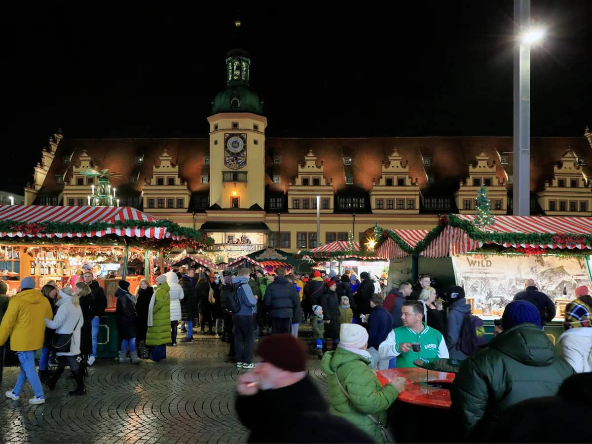 Leipzig Altes Rathaus illuminated at twilight during Christmas market