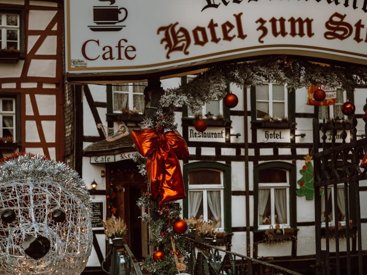 Monschau half-timbered hotel facade decorated for Christmas