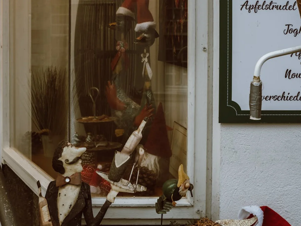 Monschau charming window display of handcrafted Santa figures during Christmas season