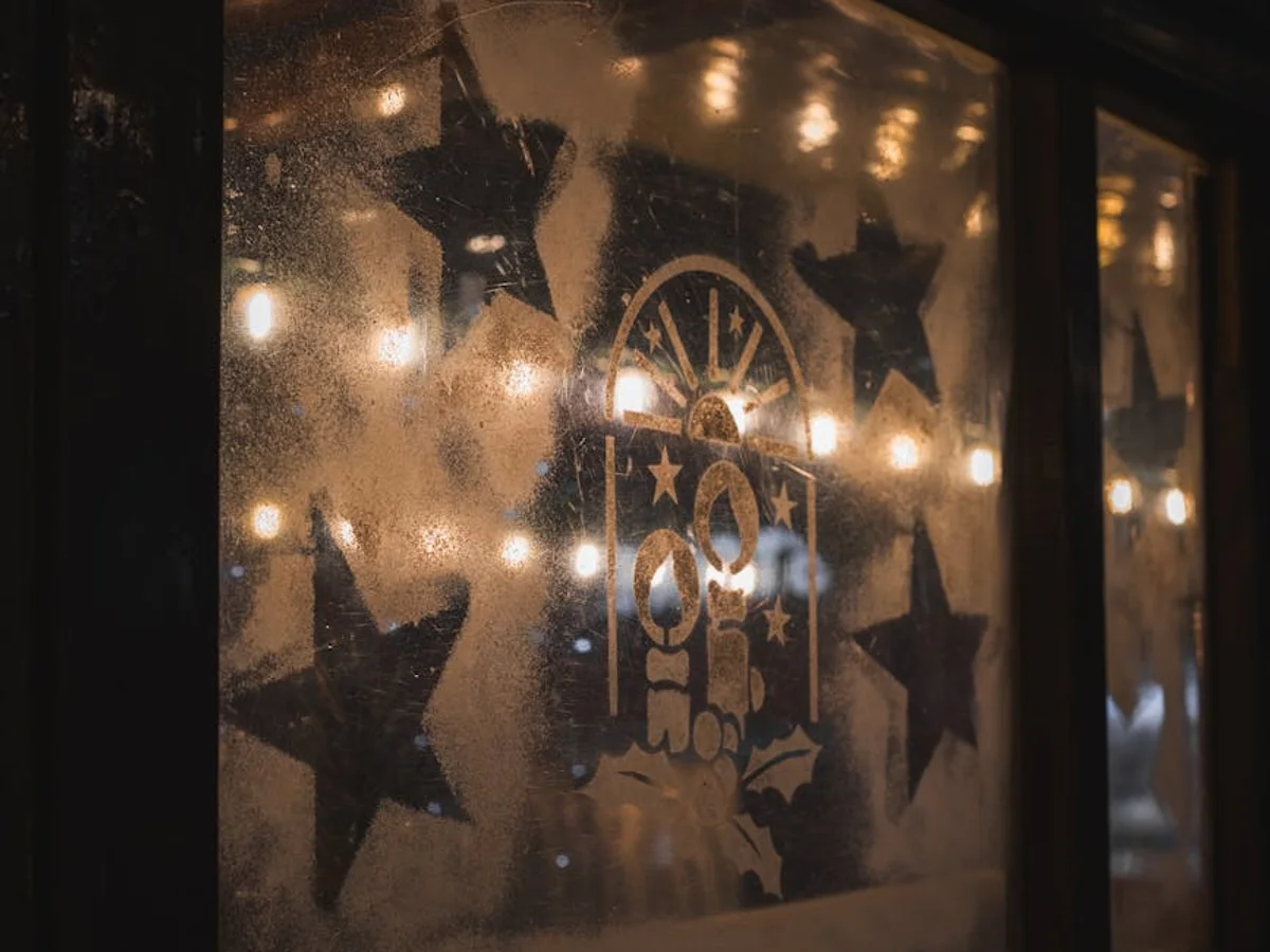 Munich frosted window display with twinkling lights in a magical Christmas atmosphere