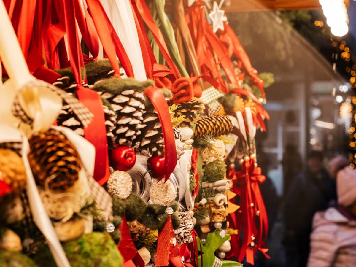 Munich handcrafted Christmas ornaments with warm evening market lighting