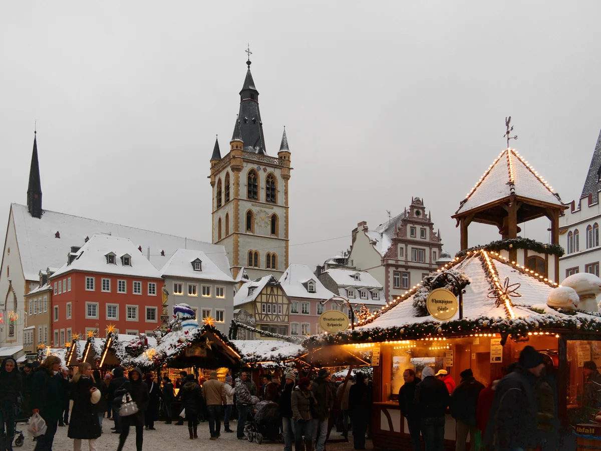 Trierer Weihnachtsmarkt - Domfreihof with Trier Cathedral at dusk, festive ambiance