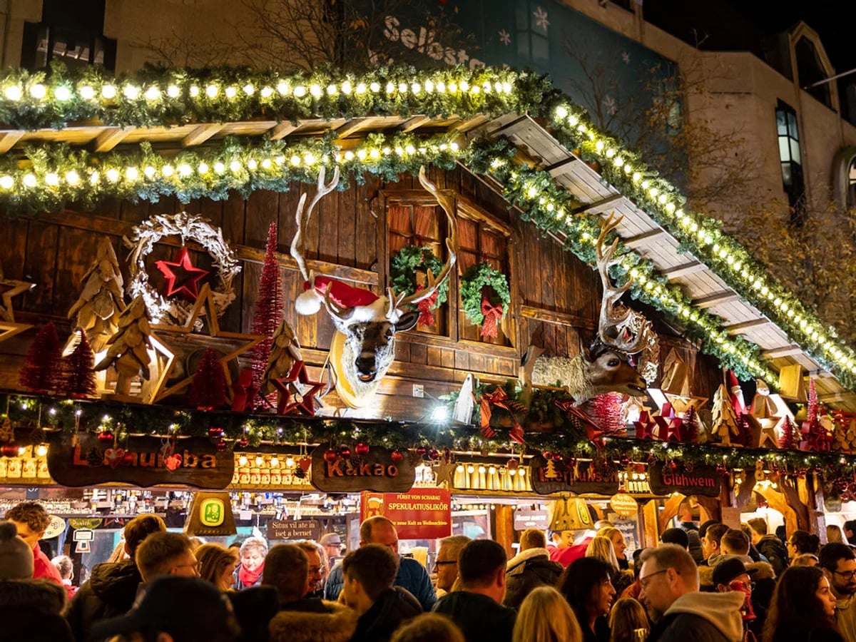 Ulmer Weihnachtsmarkt beautifully illuminated stall in Ulm captures festive atmosphere near historic Münsterplatz