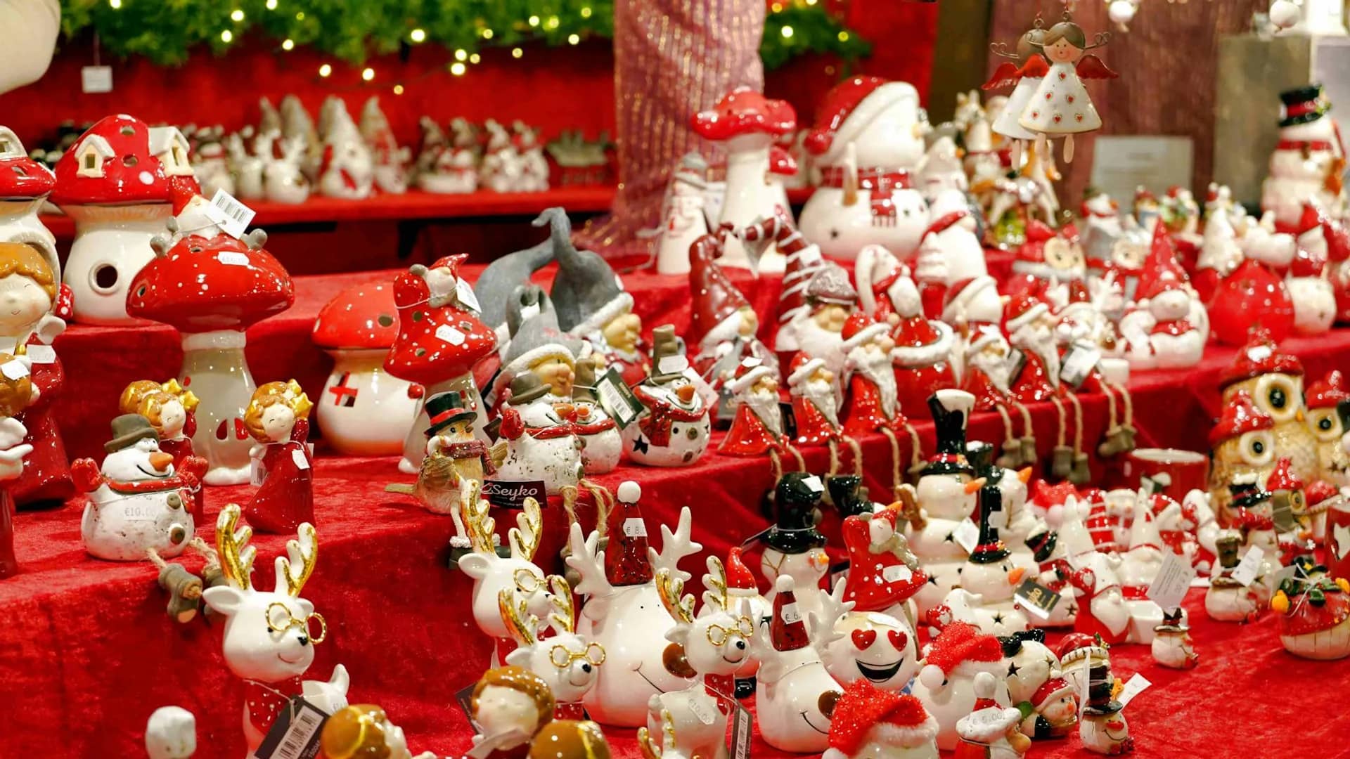 Thessaloniki vibrant Christmas ornaments on a festive red vendor display