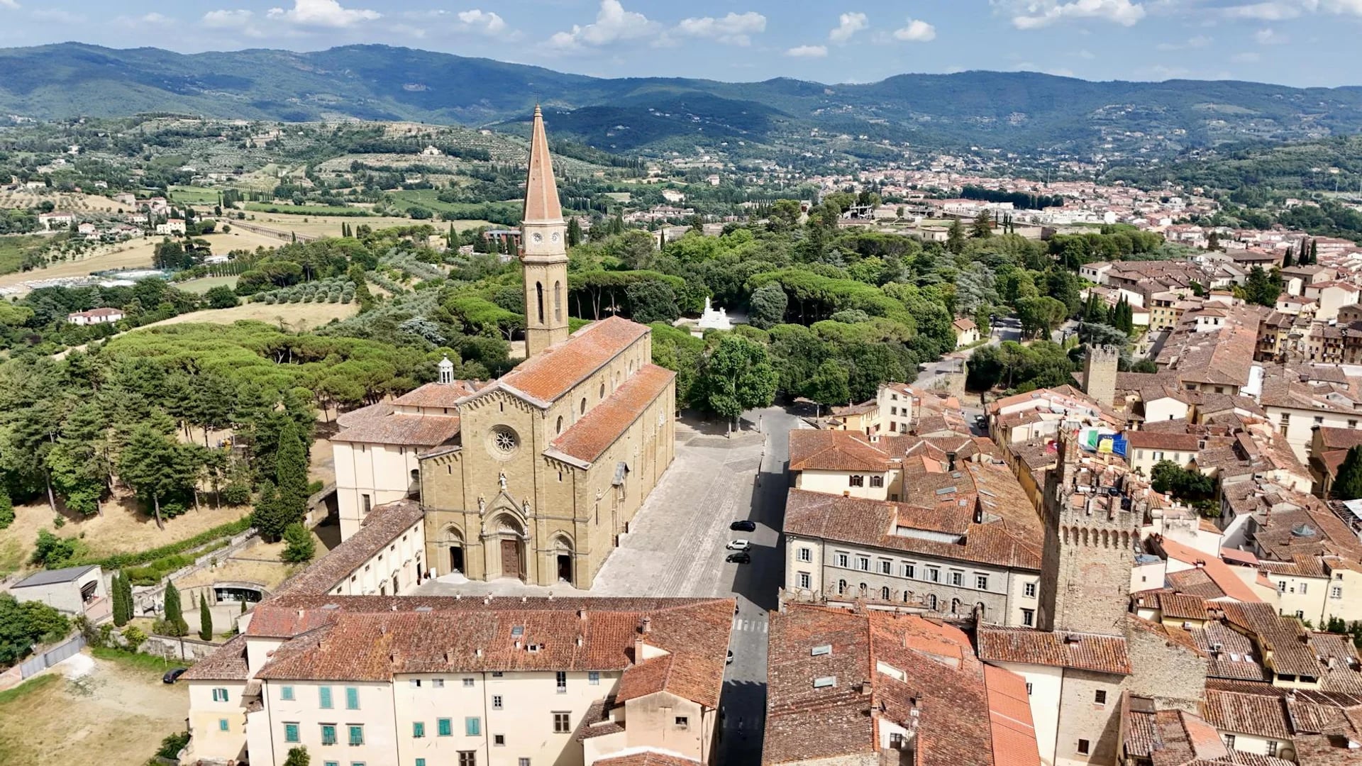 Arezzo Cathedral towering over the medieval town in winter scenery