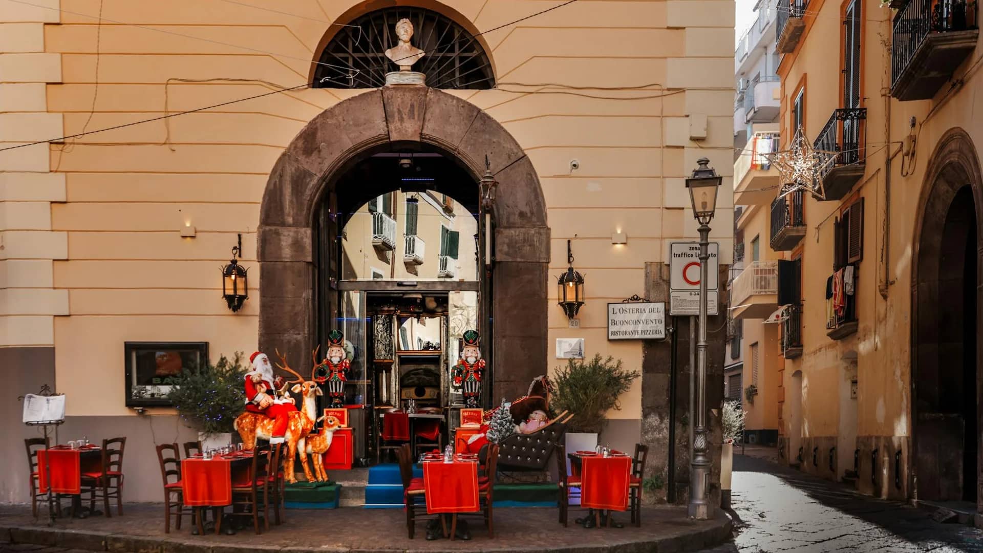 Naples charming restaurant entrance adorned for Christmas winter