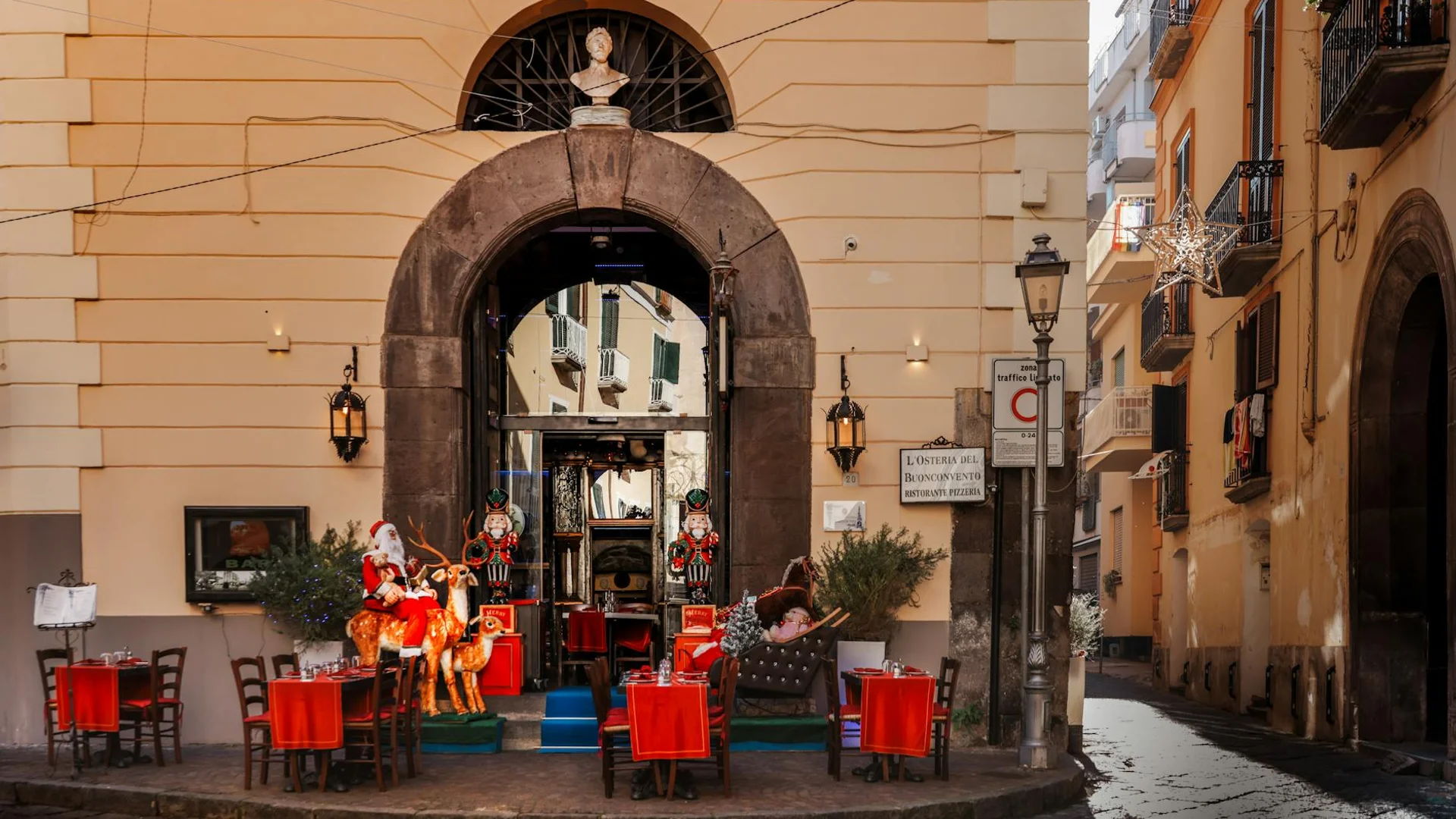 Naples charming restaurant entrance adorned for Christmas winter