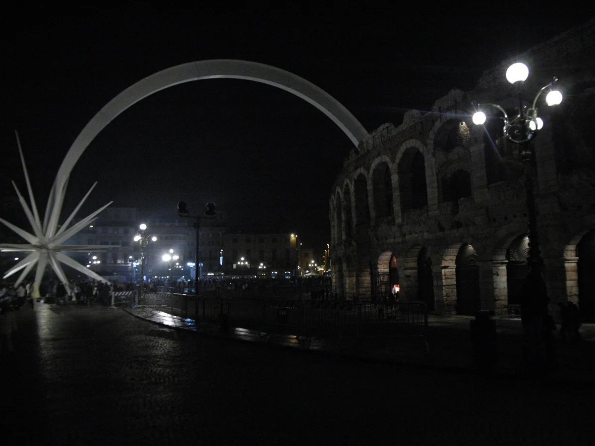 Verona Arena and modern comet sculpture in winter festive atmosphere