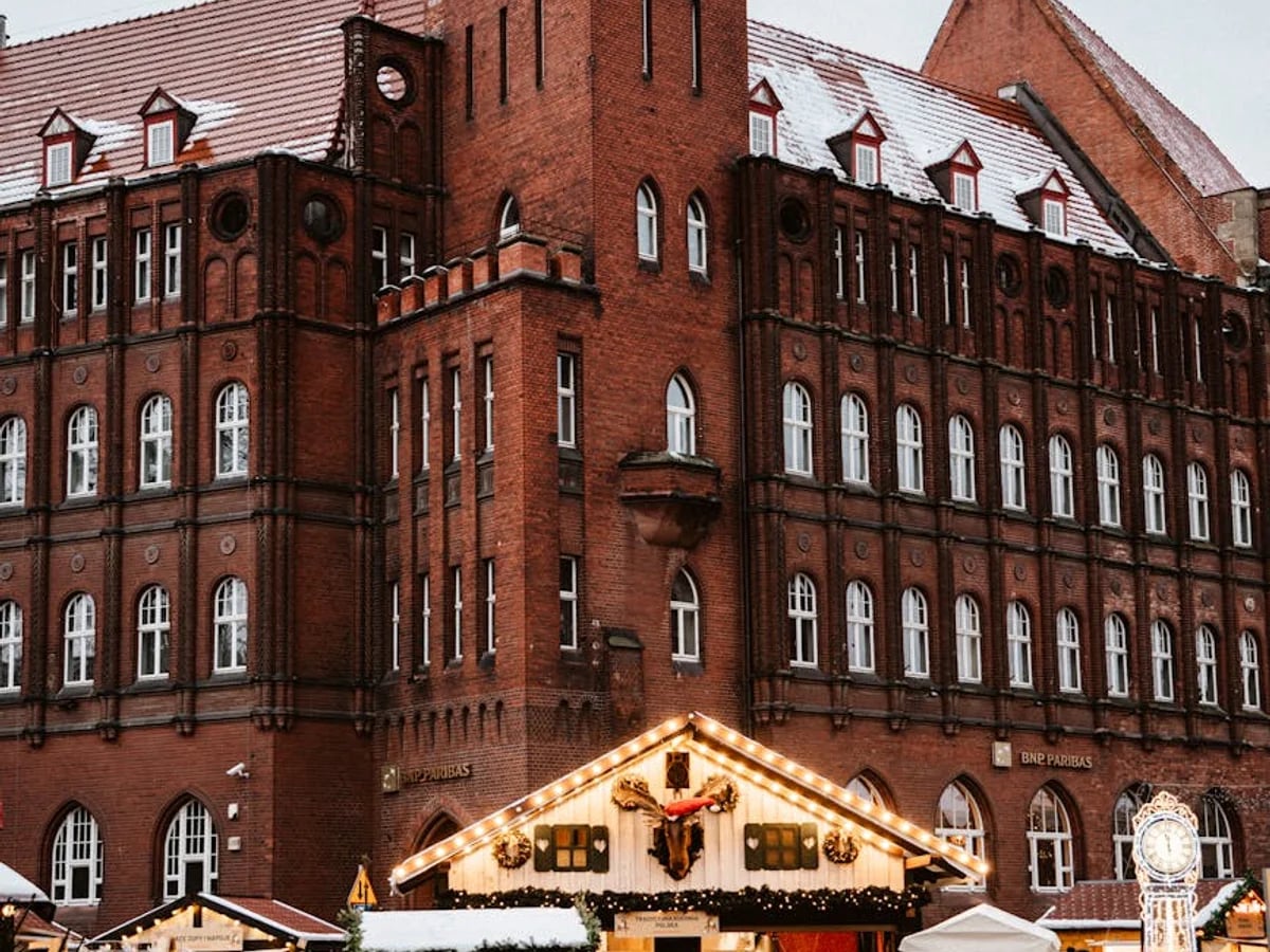 Gdansk historic red brick architecture with festive Christmas market atmosphere
