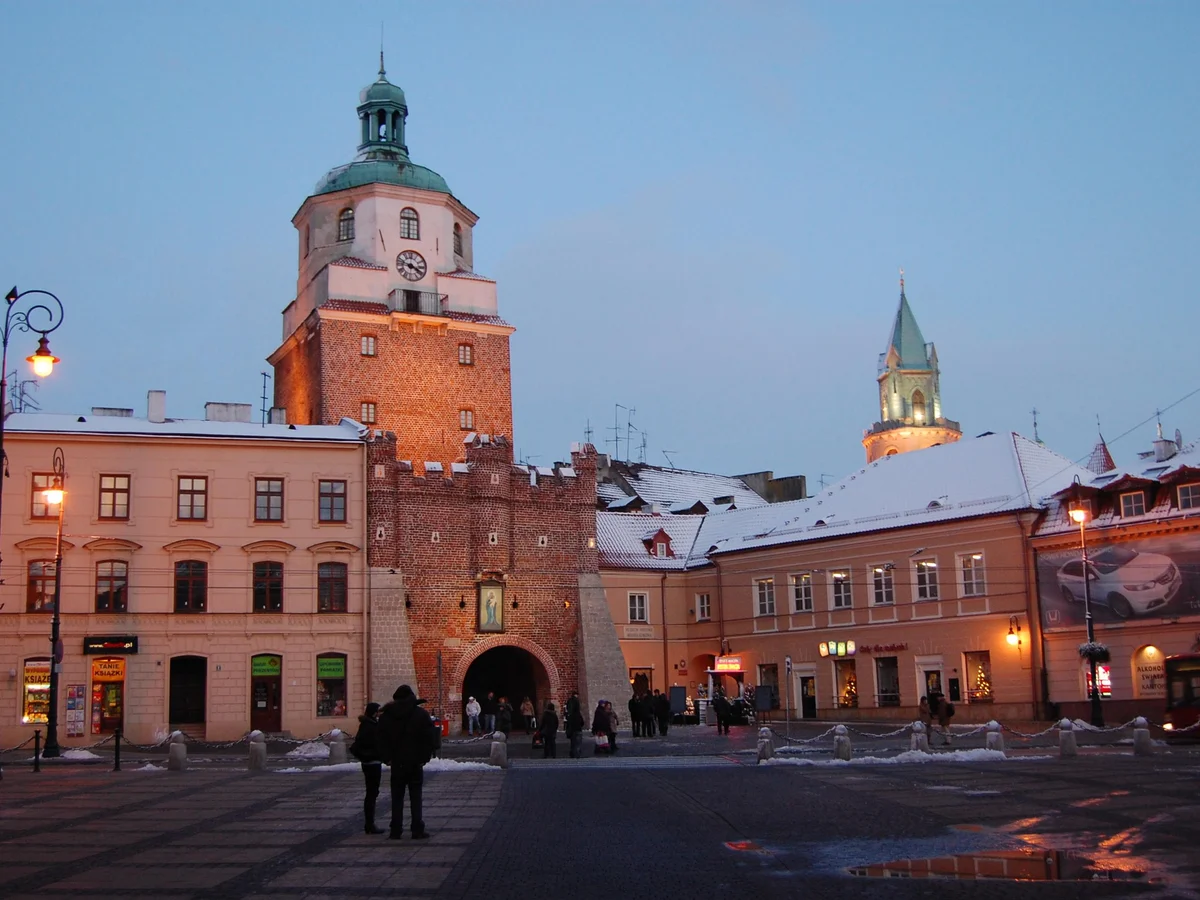 Lublin Brama Krakowska glows in winter twilight during the festive season
