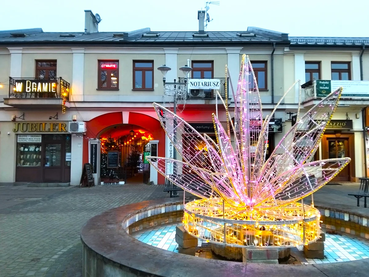 Lublin illuminated star sculpture at twilight during Christmas season