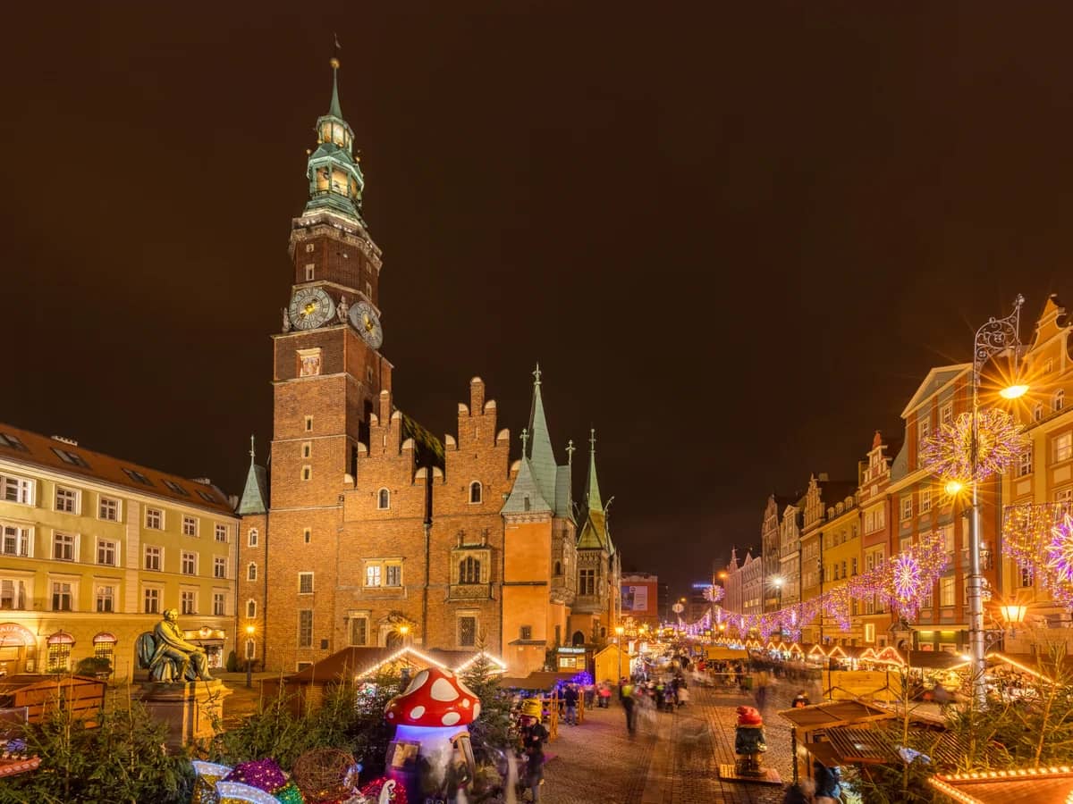 Wroclaw Town Hall illuminated during Wroclaw Christmas market at twilight