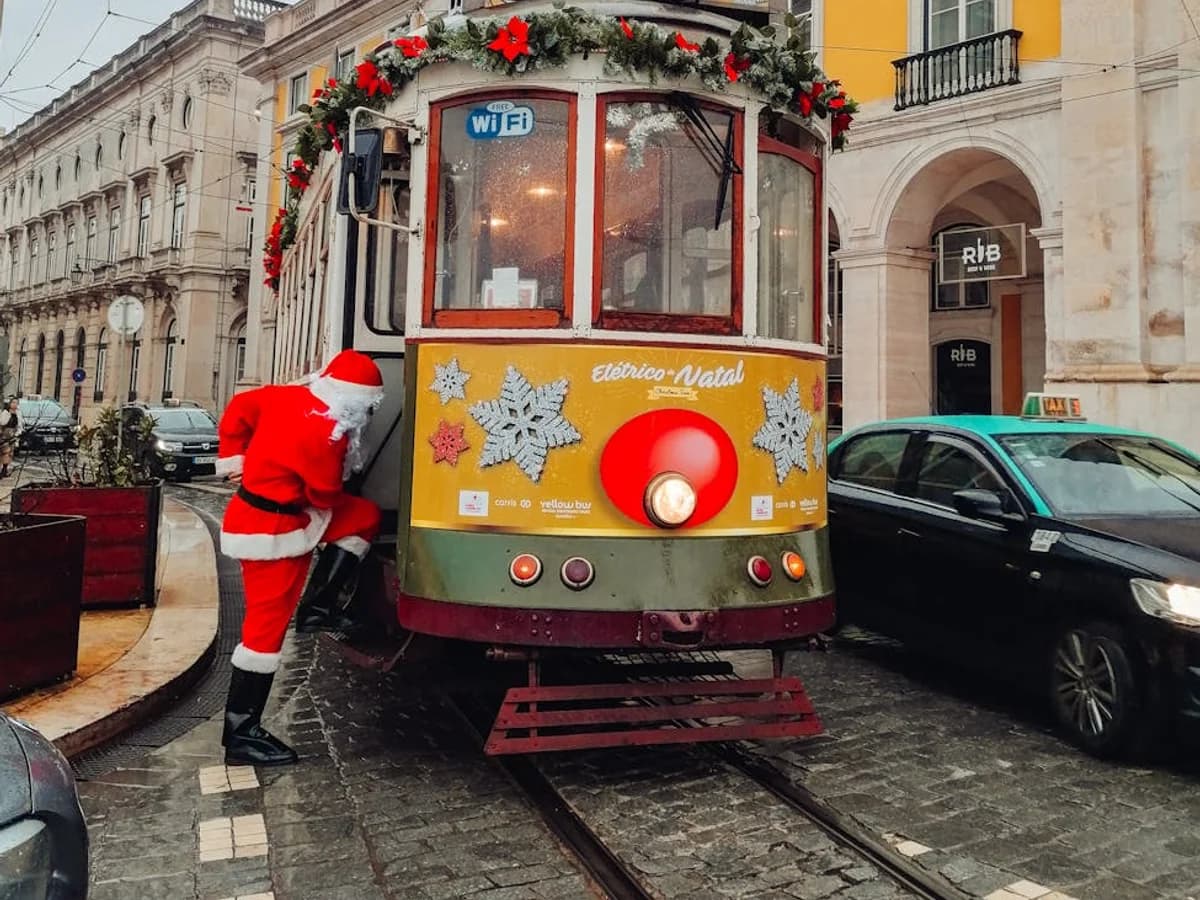 Lisbon festive tram with Santa boarding during Christmas season